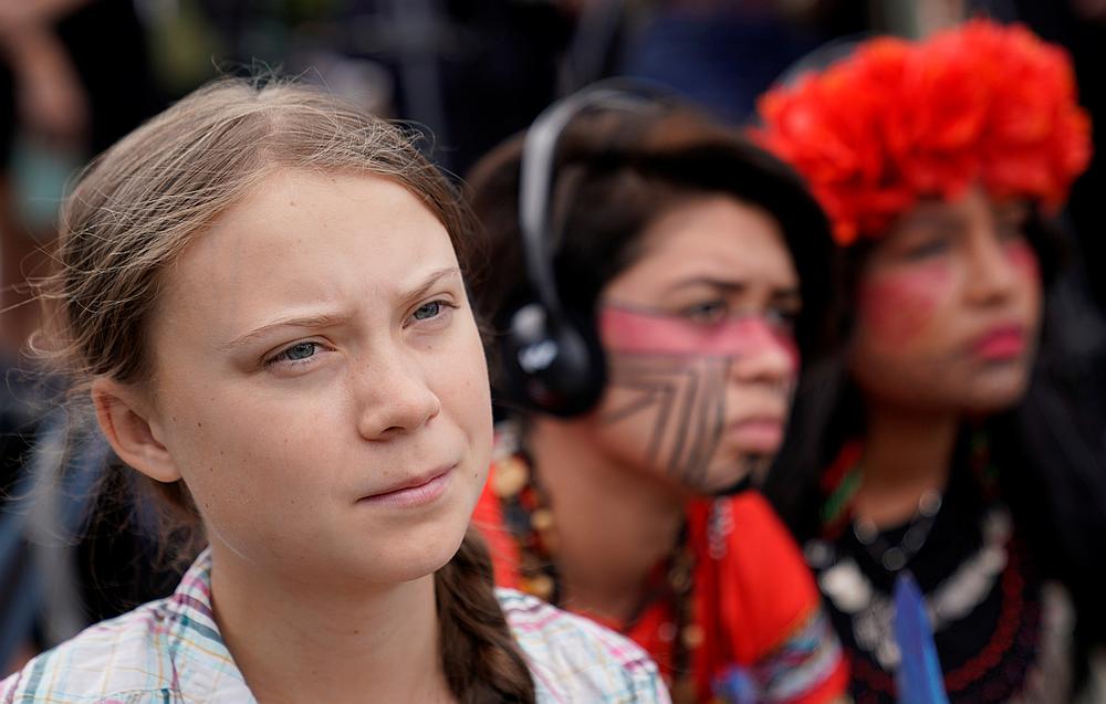 Sixteen-year-old Swedish climate activist Greta Thunberg listens to speakers during a climate change demonstration at the US Supreme Court in Washington September 18, 2019. u00e2u20acu201d Reuters pic