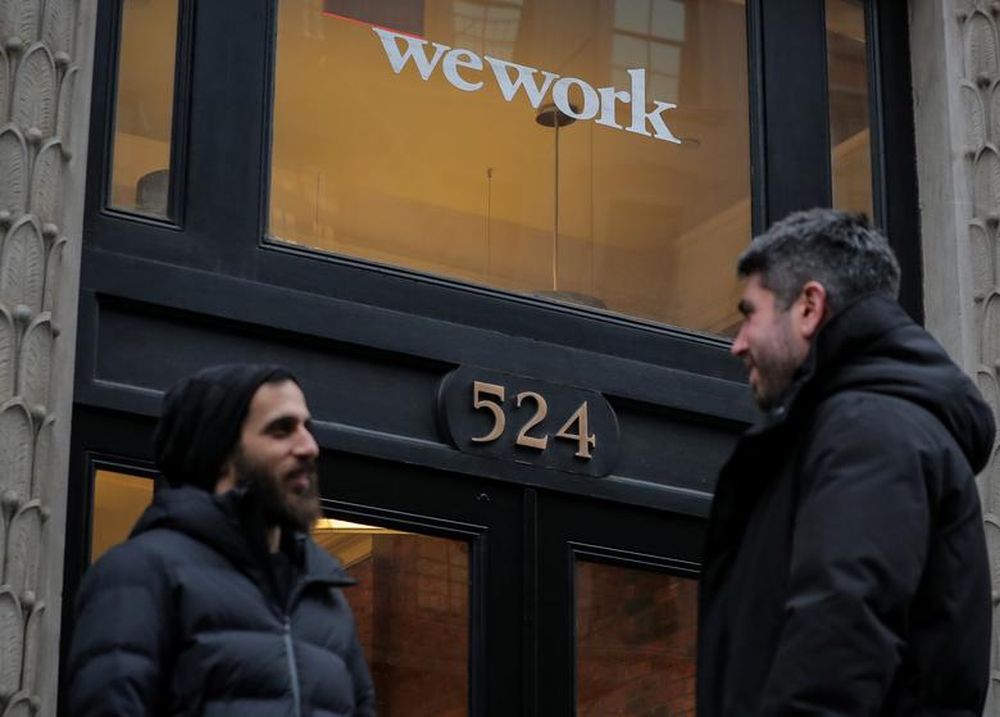 People stand outside a WeWork co-working space in New York City, January 8, 2019. u00e2u20acu201d Reuters pic
