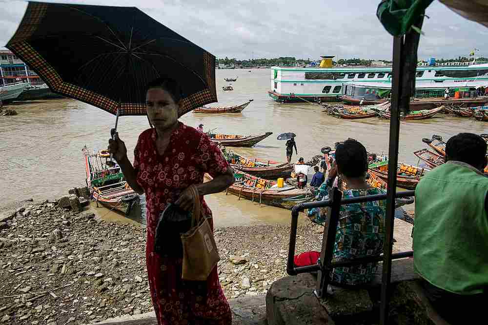 People from Dala township arriving by boat in Yangon after crossing the Yangon River August 1, 2019. u00e2u20acu201d AFP pic