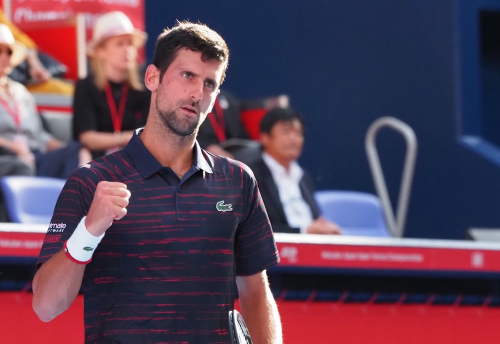 Serbiau00e2u20acu2122s Novak Djokovic reacts during the menu00e2u20acu2122s singles quarter-final match against Franceu00e2u20acu2122s Lucas Pouille at the Japan Open tennis tournament in Tokyo October 4, 2019. u00e2u20acu201d AFP pic