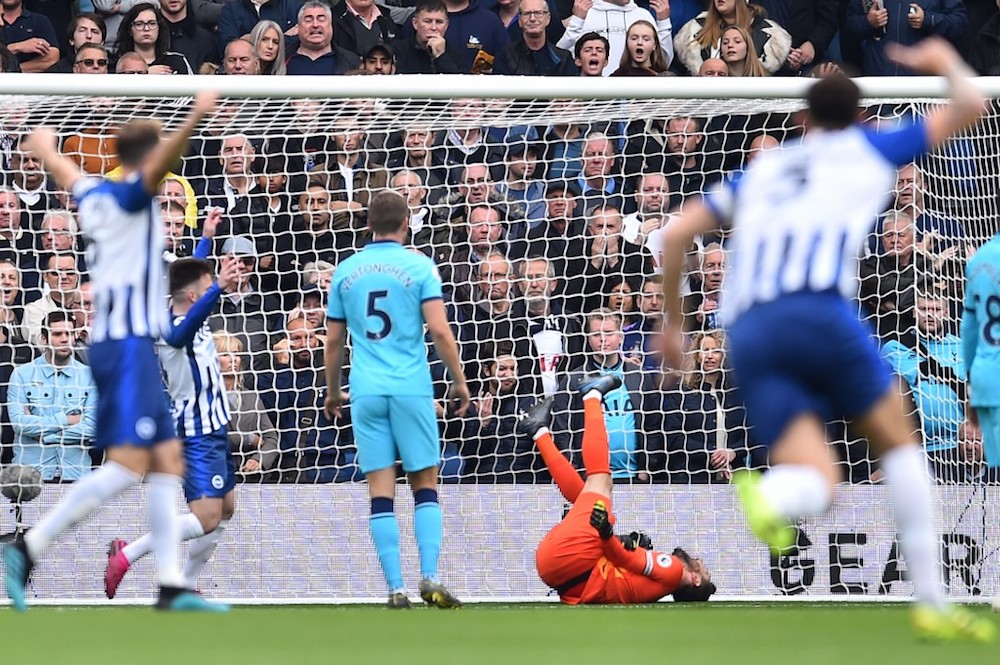 Tottenham Hotspuru00e2u20acu2122s goalkeeper Hugo Lloris lies injured after Brightonu00e2u20acu2122s Neal Maupay scores his teamu00e2u20acu2122s first goal during their English Premier League match at the American Express Community Stadium in Brighton October 5, 2019. u00e2u20acu201d AFP pic