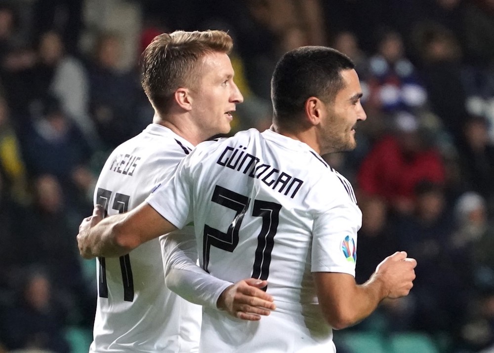Germanyu00e2u20acu2122s Ilkay Gundogan celebrates scoring with Marco Reus during the Euro 2020 qualifier Group C match with Estonia in Tallinn, Estonia October 13, 2019. u00e2u20acu201d AFP pic