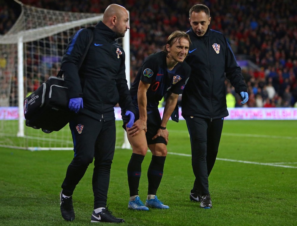 Croatiau00e2u20acu2122s Luka Modric is helped from the pitch after picking up an injury during the Euro 2020 qualification match with Wales at Cardiff City Stadium, Cardiff October 13, 2019. u00e2u20acu201d AFP pic