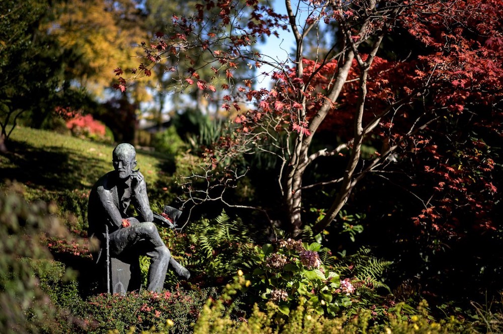 The sculpture depicting Irish author James Joyce is seen behind his grave in Fluntern cemetery in Zurich October 17, 2019. u00e2u20acu201d AFP pic