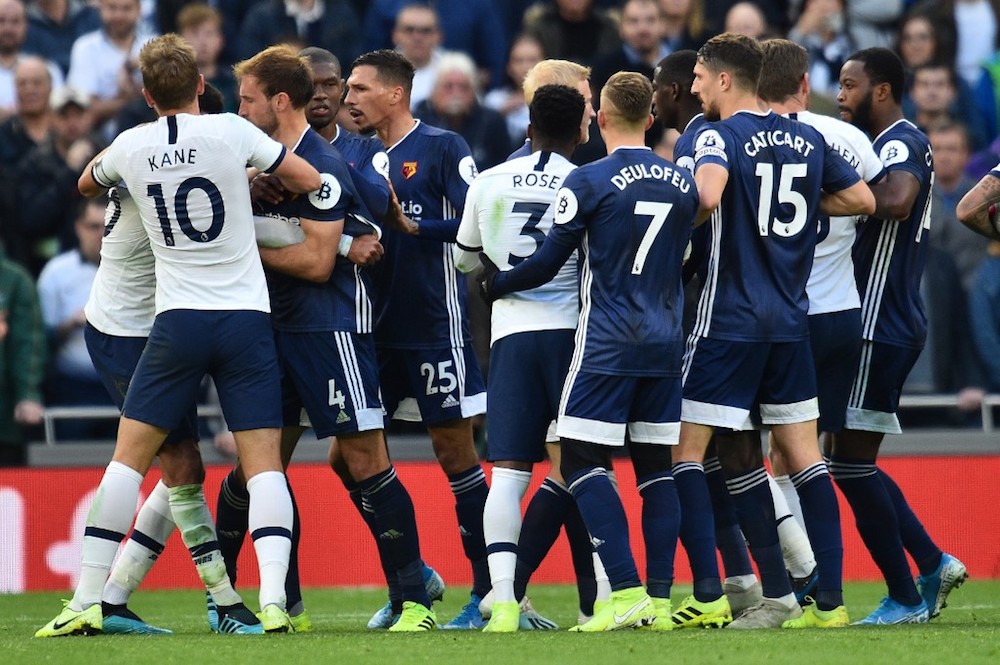 Tottenham Hotspur’s Harry Kane intervenes as tempers rise during the Premier League match with Watford at Tottenham Hotspur Stadium in London January 1, 2019. — AFP pic