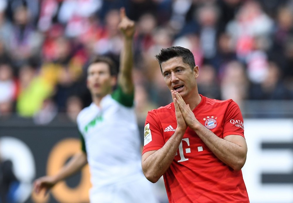Bayern Munich’s Robert Lewandowski reacts during the Bundesliga match with Augsburg in Augsburg October 19, 2019. — AFP pic