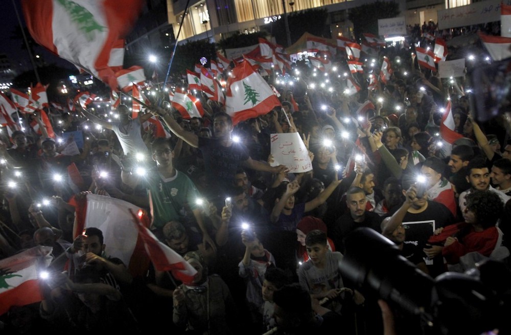 Lebanese protestors gather during demonstrations to demand better living conditions and the ouster of a cast of politicians who have monopolised power and influence for decades, in the southern city of Sidon October 22, 2019. u00e2u20acu201d AFP pic