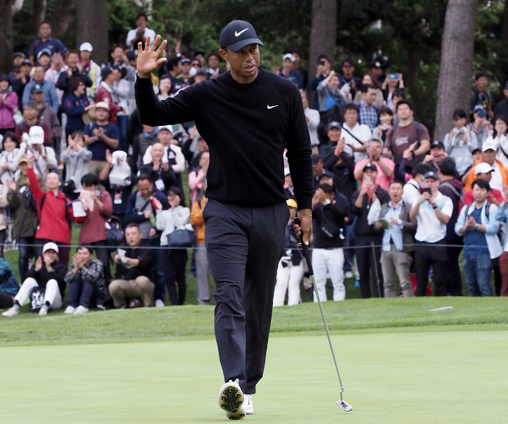 Tiger Woods of the US acknowledges cheers on the 5th hole green during the first round of the Zozo Championship golf tournament at the Narashino Country Club in Inzai, Chiba prefecture October 24, 2019. u00e2u20acu201d AFP pic