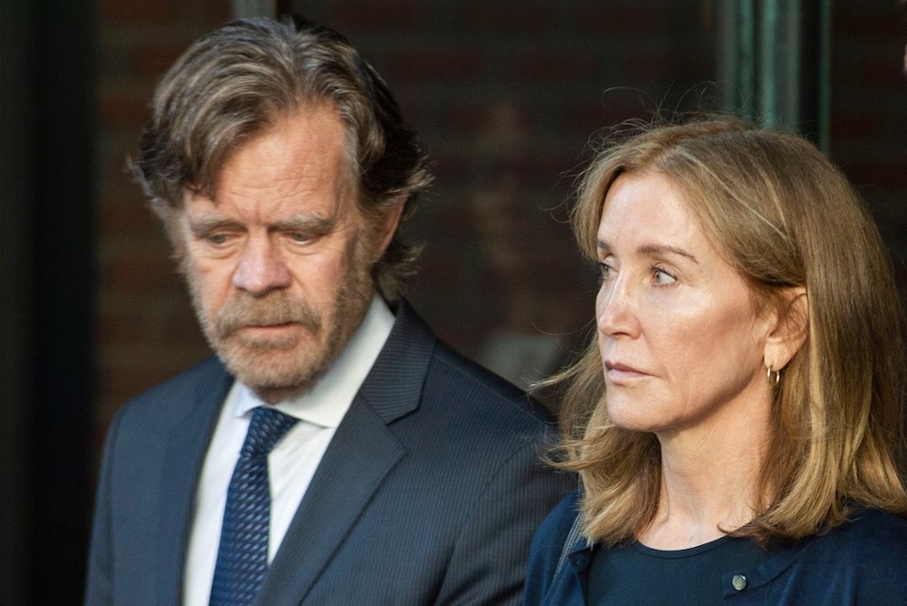 Actress Felicity Huffman, escorted by her husband actor William H. Macy, exits the John Joseph Moakley United States Courthouse in Boston September 13, 2019. u00e2u20acu201d AFP pic