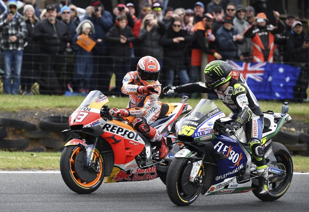 Repsol Honda Team rider Marc Marquez of Spain (left) celebrates victory with second place LCR Honda Castrol rider Cal Crutchlow of Britain after winning the Australian MotoGP at Phillip Island October 27, 2019. u00e2u20acu201d AFP pic