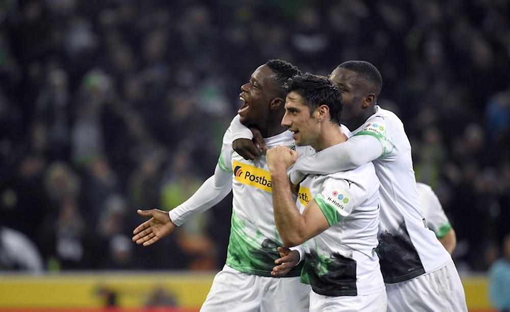 Moenchengladbachu00e2u20acu2122s Denis Zakaria, Lars Stindl and Marcus Thuram celebrate their 4-2 win during the Bundesliga match with Eintracht Frankfurt in Moenchengladbach October 27, 2019. u00e2u20acu201d AFP pic