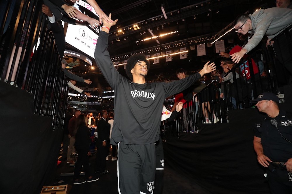 Jarrett Allen of the Brooklyn Nets high-fives fans after the game against Franca at Barclays Centre in Brooklyn, New York October 4, 2019. u00e2u20acu201d AFP pic