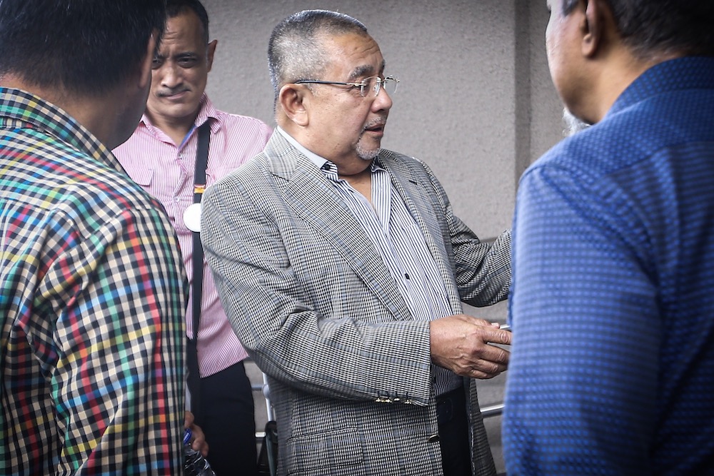 Former Felda chairman Tan Sri Mohd Isa Abdul Samad is seen at the Kuala Lumpur Court Complex, October 8, 2019. u00e2u20acu201d Picture by Hari Anggara