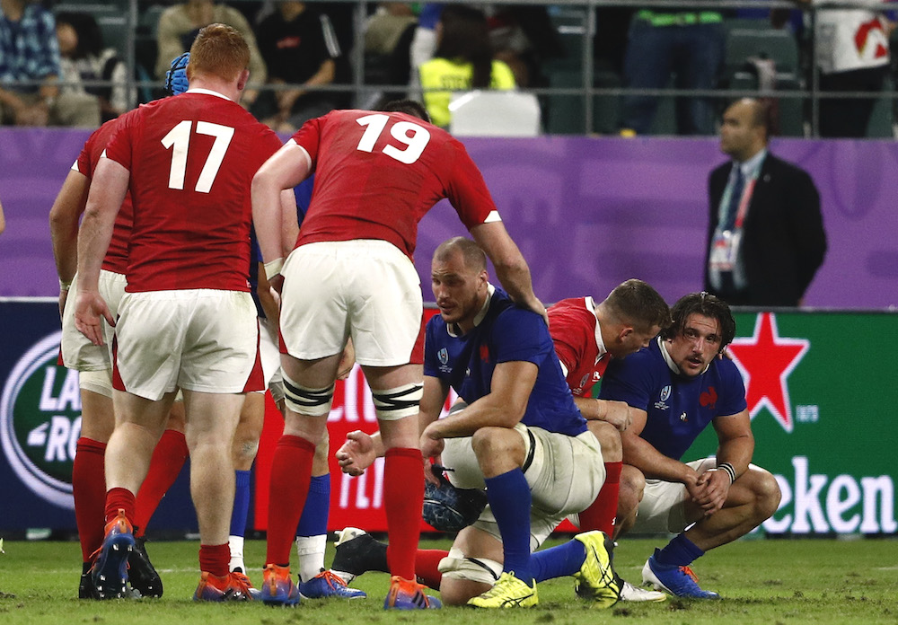 Wales players console France players after the match in Oita October 20, 2019. u00e2u20acu201d Reuters pic 