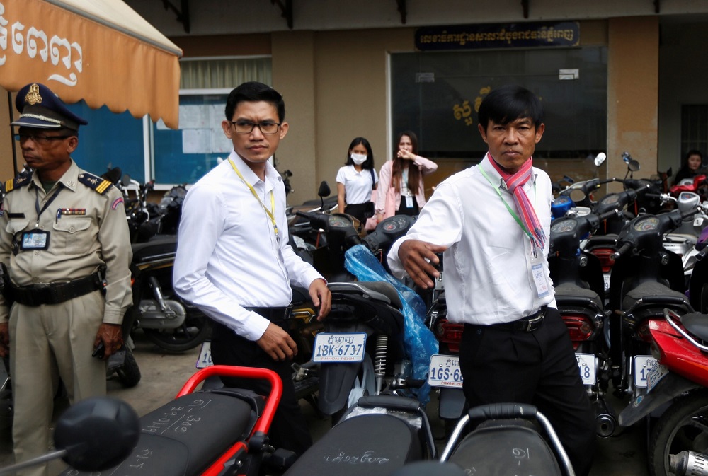Uon Chhin and Yeang Sothearin, former journalists from the US-funded Radio Free Asia (RFA), who are accused of espionage, arrive at the Municipal Court of Phnom Penh for their trial proceedings, in Phnom Penh August 9, 2019. u00e2u20acu201d Reuters pic