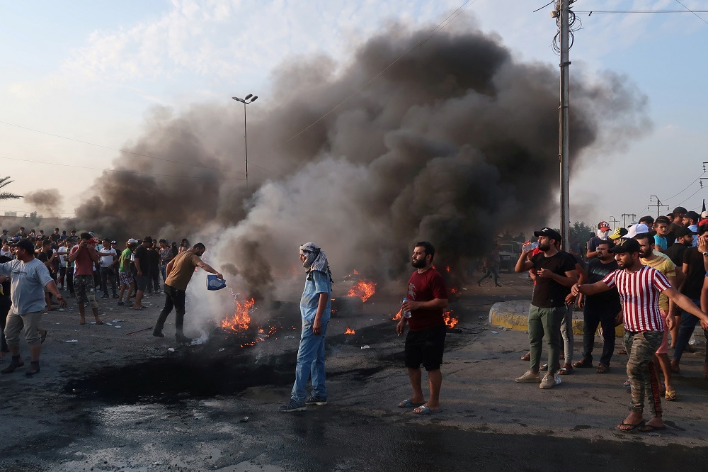 Demonstrators gather as they block the road with burning tires during a protest over unemployment, corruption and poor public services, in Baghdad, Iraq October 2, 2019. u00e2u20acu201d Reuters pic