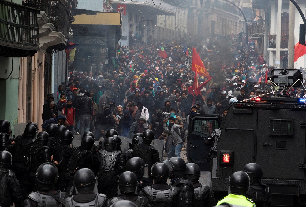 Demonstrators clash with riot police during protests after Ecuador’s President Lenin Moreno’s government ended four-decade-old fuel subsidies, in Quito, Ecuador October 3, 2019. — Reuters pic