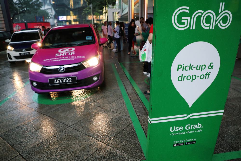A Grab pick-up and drop-off station is seen at the entrance of Kuala Lumpur City Centre in Kuala Lumpur October 3, 2019. u00e2u20acu201d Reuters pic