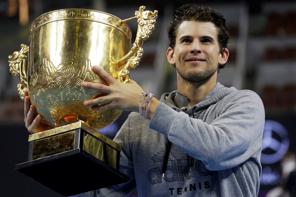 Dominic Thiem of Austria celebrates winning China Open with his trophy at the National Tennis Centre in Beijing October 6, 2019. u00e2u20acu201d Reuters pic
