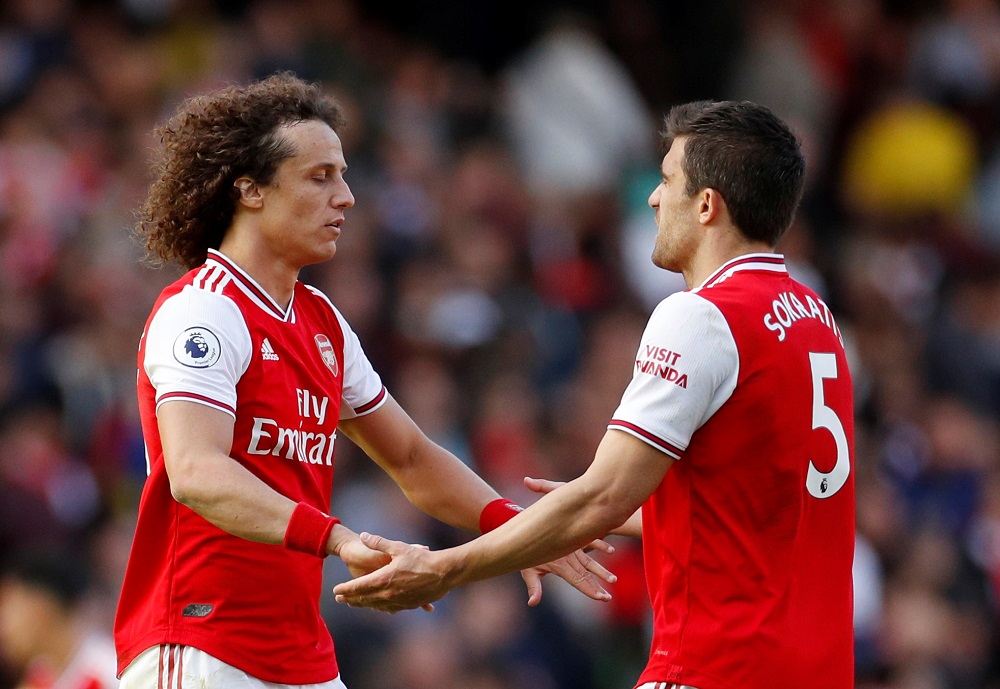 Arsenalu00e2u20acu2122s David Luiz and Sokratis Papastathopoulos after the match against Bournemouth at the Emirates Stadium in London October 6, 2019. u00e2u20acu201d Action Images via Reuters