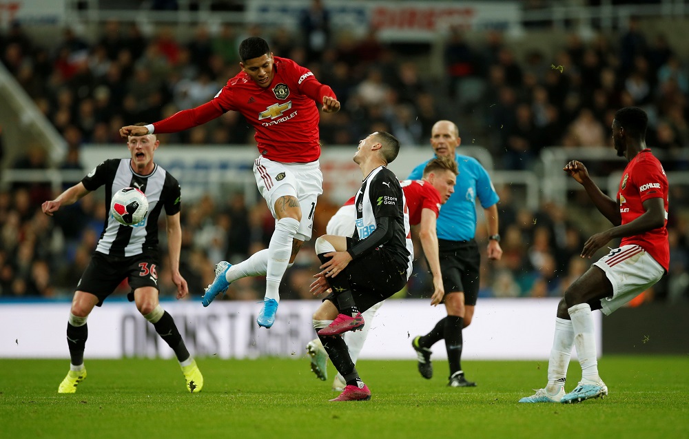 Manchester Unitedu00e2u20acu2122s Marcos Rojo in action with Newcastle Unitedu00e2u20acu2122s Miguel Almiron at St Jamesu00e2u20acu2122 Park, Newcastle October 6, 2019. u00e2u20acu201d Action Images via Reuters