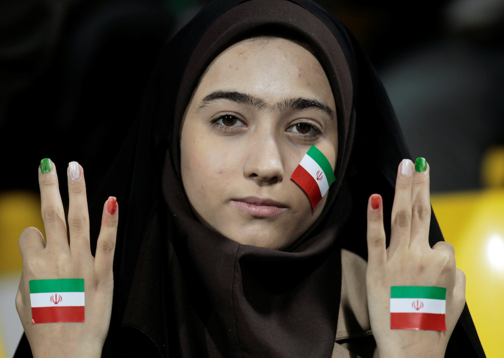 An Iran fan gestures before their 2011 Asian Cup Group D match against United Arab Emirates at Qatar Sports Club stadium in Doha January 19, 2011. u00e2u20acu201d Reuters pic