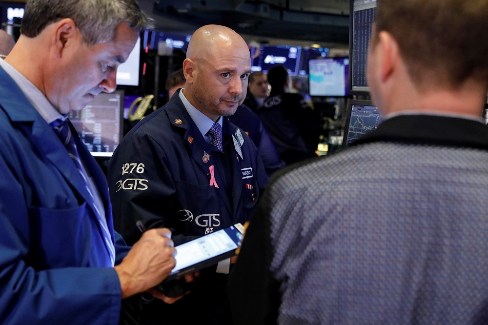 Traders work on the floor at the New York Stock Exchange October 9, 2019. u00e2u20acu201d Reuters pic