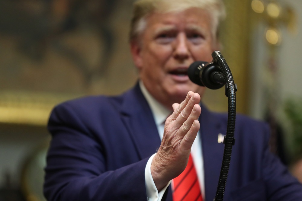 US President Donald Trump answers questions from reporters during an event to sign executive orders on u00e2u20acu02dctransparency in federal guidance and enforcementu00e2u20acu2122 in the Roosevelt Room of the White House in Washington October 9, 2019. u00e2u20acu201d Reuters pic