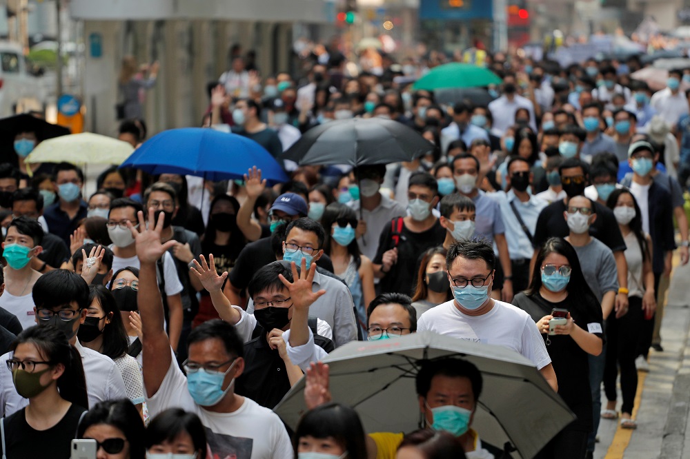 People march to protest against what they say is the abuse of pro-democracy protesters by Hong Kong police, at Chater Garden in Central district, Hong Kong October 11, 2019. u00e2u20acu201d Reuters pic