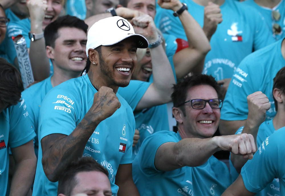 Mercedesu00e2u20acu2122 Lewis Hamilton poses for a photograph with the Mercedes team after the Japanese Grand Prix at Suzuka Circuit October 13, 2019. u00e2u20acu201d Reuters pic