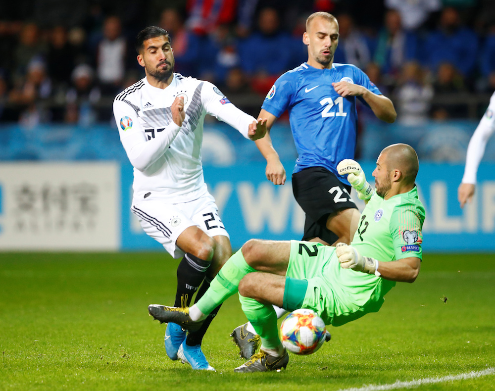 Estoniau00e2u20acu2122s Sergei Lepmets and Nikita Baranov in action with Germanyu00e2u20acu2122s Emre Can during the Euro 2020 Qualifier Group C match in Tallinn, Estonia October 13, 2019. u00e2u20acu201d Reuters pic
