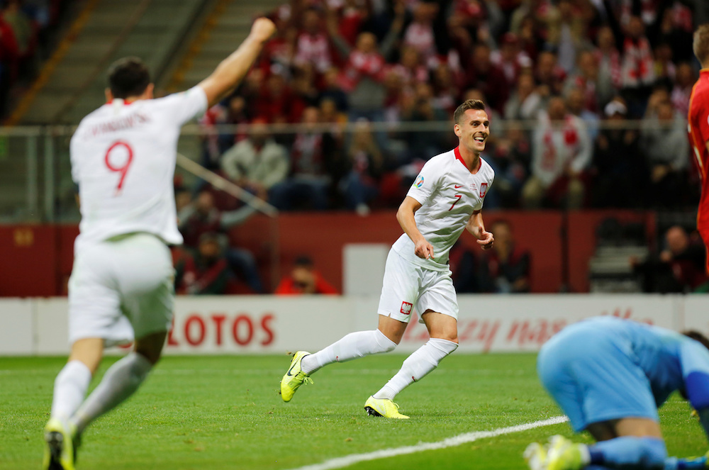 Polandu00e2u20acu2122s Arkadiusz Milik celebrates scoring their second goal during the Euro 2020 Qualifier Group G match with North Macedonia at PGE Narodowy in Warsaw October 13, 2019. u00e2u20acu201d Reuters pic