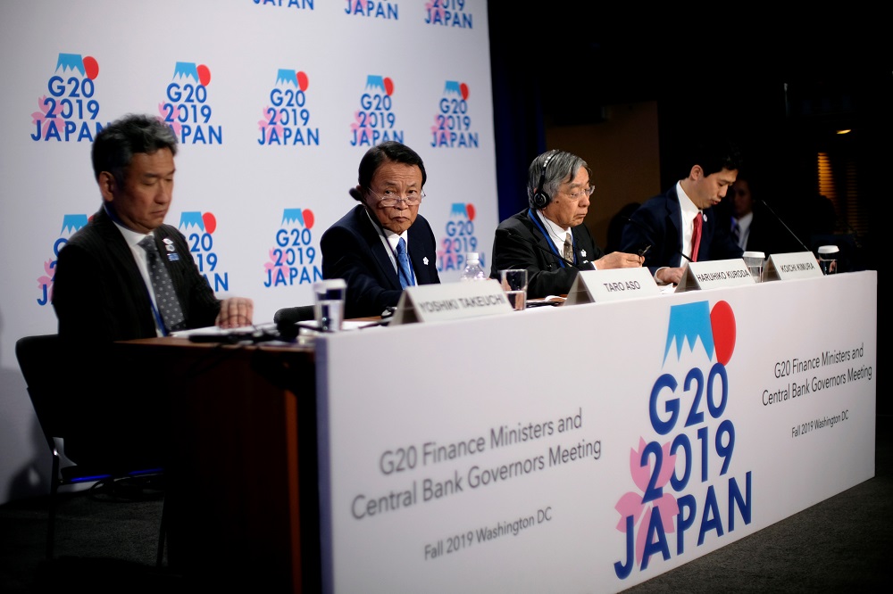 (From left) Japanese Vice Finance Minister Yoshiki Takeuchi, Finance Minister Taro Aso, and Bank of Japan Governor Haruhiko Kuroda take questions from reporters at the annual meetings of the IMF and World Bank in Washington October 18, 2019.u00e2u20acu201dReuters pic