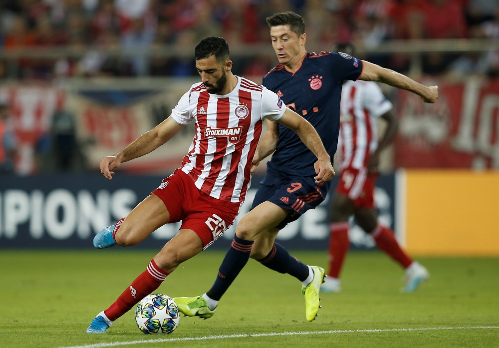 Olympiakos' Yassine Meriah in action with Bayern Munich's Robert Lewandowski at the Karaiskakis Stadium in Piraeus, Greece October 22, 2019. u00c2u00acu00e2u20acu201d Reuters pic