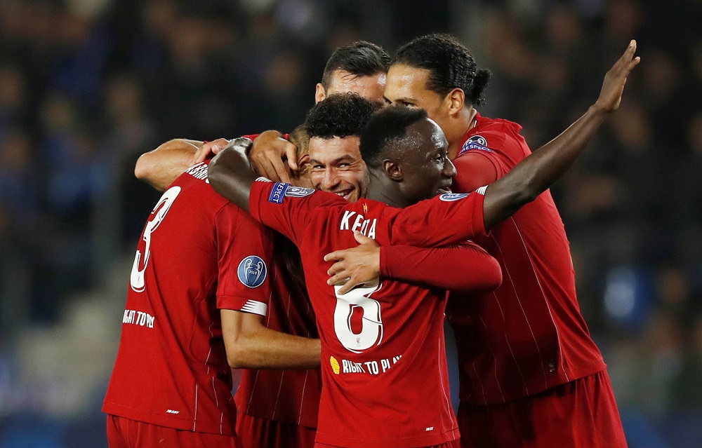 Liverpoolu00e2u20acu2122s Alex Oxlade-Chamberlain celebrates scoring their second goal with teammates at the Luminus Arena in Genk October 23, 2019. u00c2u00acu00e2u20acu201d Action Images via Reuters