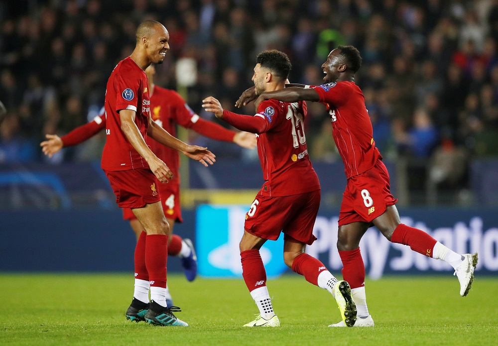 Liverpool's Alex Oxlade-Chamberlain celebrates scoring their second goal with teammates at the Luminus Arena in Genk October 23, 2019. u00e2u20acu201d Action Images via Reuters