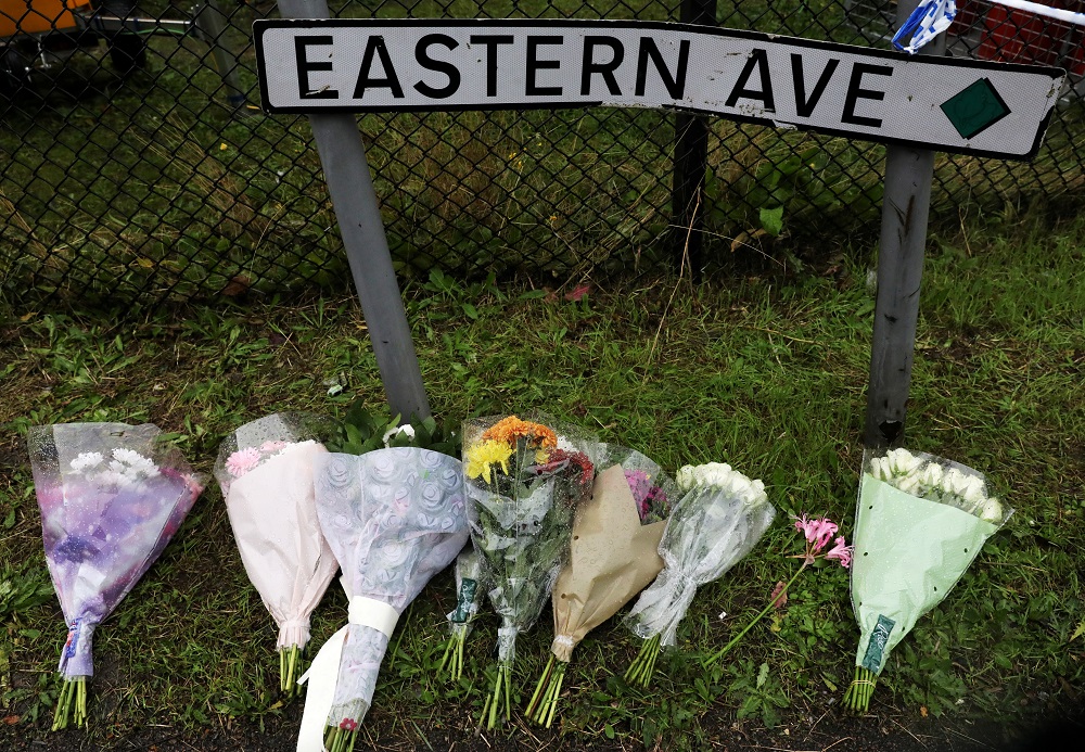 Flowers are seen at the scene where bodies were discovered in a lorry container, in Grays, Essex, Britain October 24, 2019. u00e2u20acu201d Reuters pic