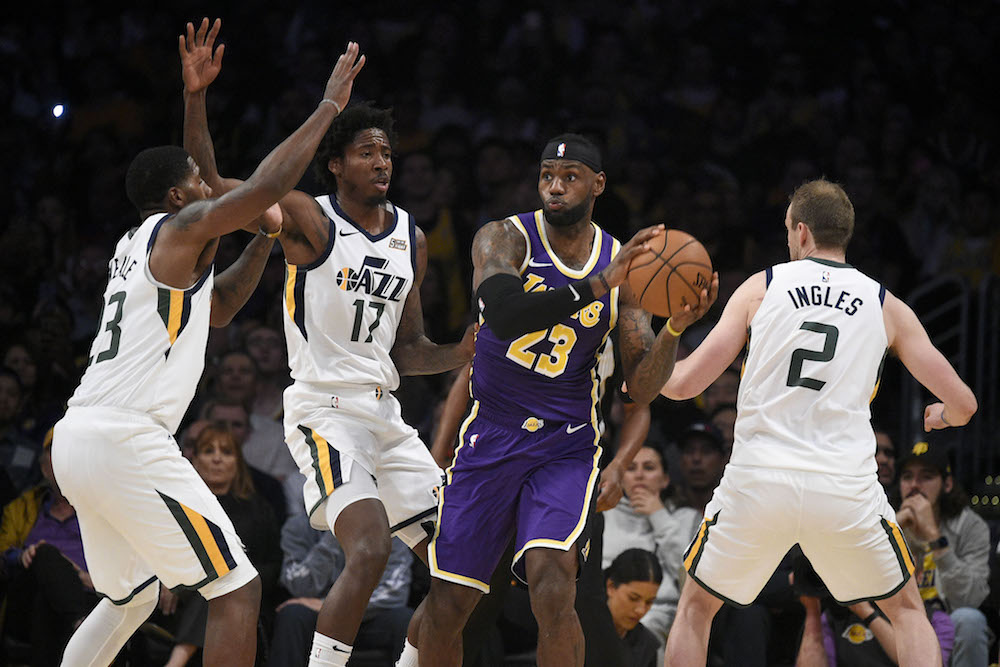 Los Angeles Lakers forward LeBron James looks to pass while Utah Jazz centre Ed Davis and forward Royce Ou00e2u20acu2122Neale defend during the second half of their NBA game in Los Angeles October 25, 2019. u00e2u20acu201d Kelvin Kuo-USA TODAY Sports pic via Reuters