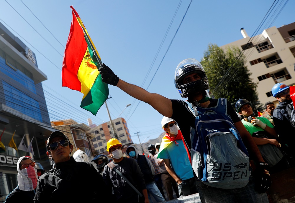 A man waves a Bolivian national flag during a protest in La Paz, Bolivia October 30, 2019. u00e2u20acu201d Reuters pic