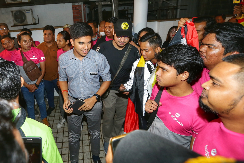 An estimated 100 Foodpanda riders attend an open dialogue with Youth and Sport Minister Syed Saddiq Abdul Rahman at his residence in Petaling Jaya October 1, 2019. u00e2u20acu201d Picture by Ahmad Zamzahuri