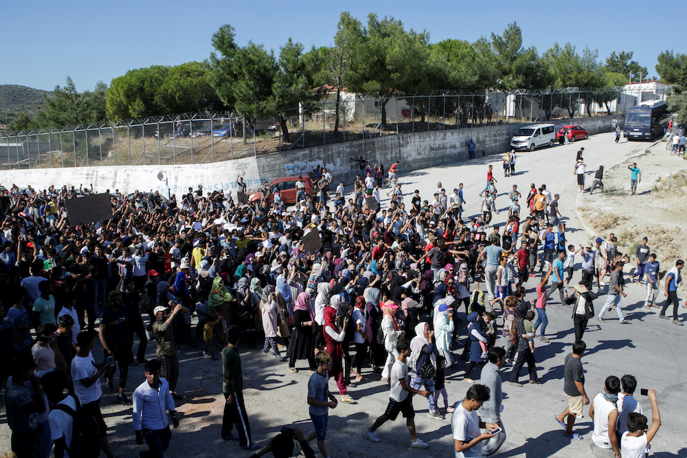 Refugees and migrants take part in a demonstration against living conditions at the Moria camp on the island of Lesbos October 1, 2019. u00e2u20acu201d Reuters pic