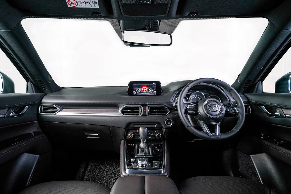 The CX-8’s dashboard panel, which incorporates real Ayous wood panels to give it a classy touch. — Picture courtesy of Mazda Malaysia