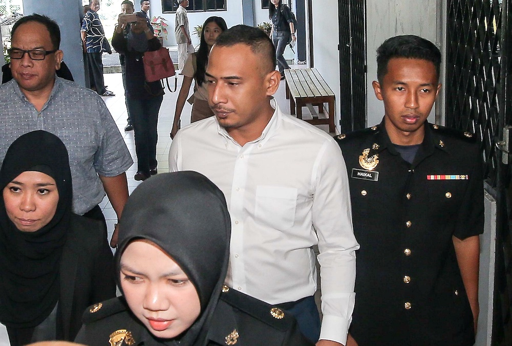 Abdulazeez Wan Ruslan, who is the son of former Companies Commission of Malaysia (SSM) CEO Datuk Zahrah Abd Wahab Fenner, appears at the Sessions Court in Ipoh October 7, 2019. — Picture by Farhan Najib