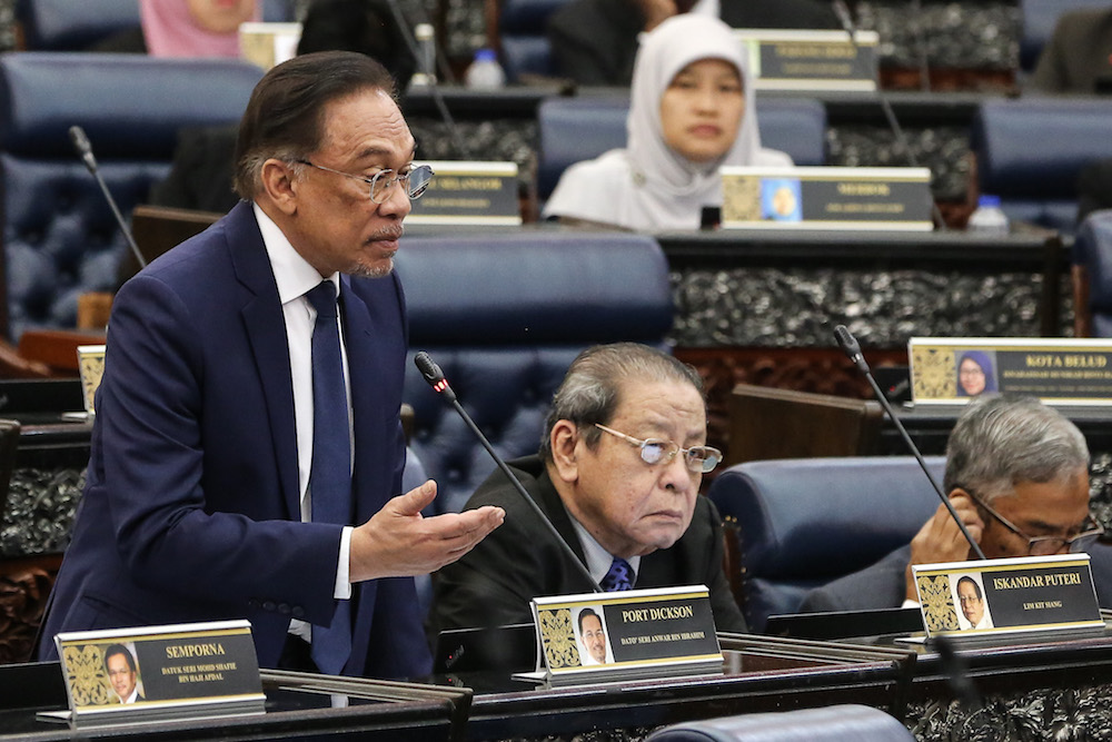 Port Dickson MP Datuk Seri Anwar Ibrahim asks a question in Parliament October 7, 2019. — Picture by Yusof Mat Isa