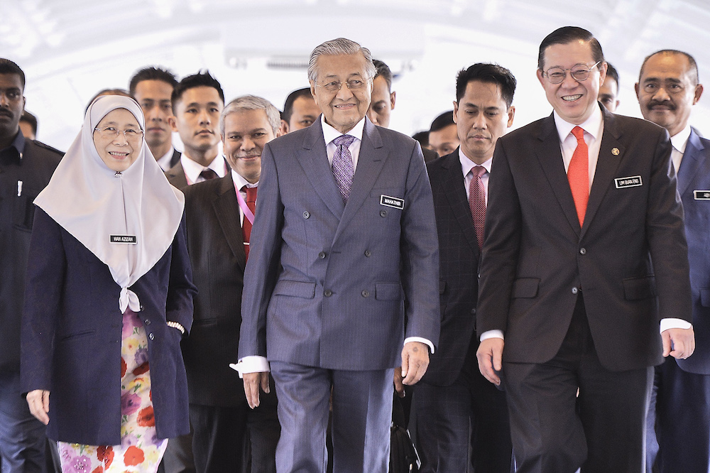 Prime Minster Tun Dr Mahathir Mohamad, Deputy Prime Minister Datuk Seri Dr Wan Azizah Wan Ismail and Finance Minister Lim Guan Eng arrive in Parliament for the tabling of Budget 2020 on October 11, 2019. u00e2u20acu201d Picture by Miera Zulyana