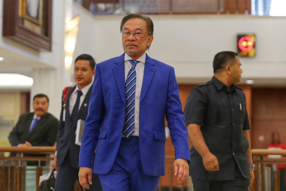 Datuk Seri Anwar Ibrahim is pictured at the Parliament lobby October 15, 2019. u00e2u20acu201d Picture by Ahmad Zamzahuri