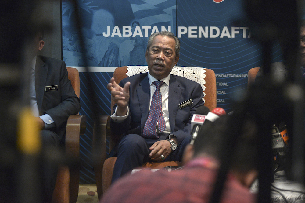 Home Minister Tan Sri Muhyiddin Yassin speaks to the media after officiating National Registration Day at the National Registration Department in Putrajaya October 16, 2019. u00e2u20acu201d Picture by Shafwan Zaidon