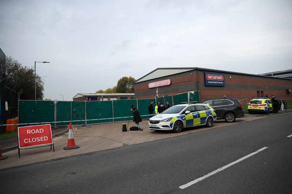 Police officers are seen at the scene where bodies were discovered in a lorry container, in Grays, Essex October 23, 2019. u00e2u20acu201d Reuters pic