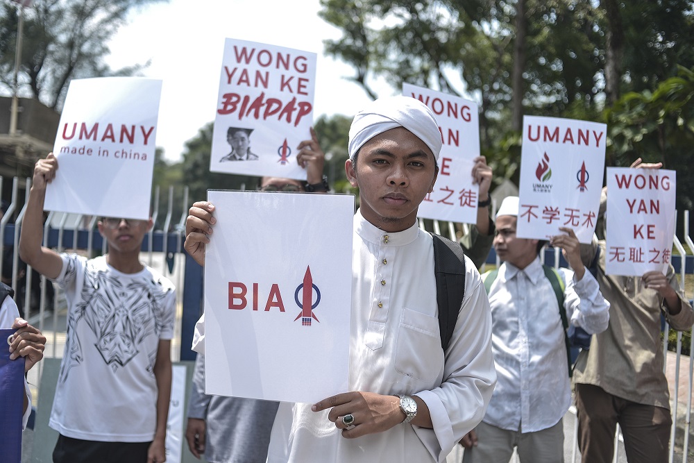 Students hold placards during a protest at Universiti Malaya in Kuala Lumpur October 25, 2019. — Picture by Shafwan Zaidon