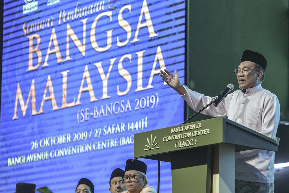 Port Dickson MP Datuk Seri Anwar Ibrahim delivers his speech during the Seminar Pembinaan Bangsa Malaysia at Bangi Avenue Convention Centre October 26, 2019. u00e2u20acu201d Picture by Shafwan Zaidon